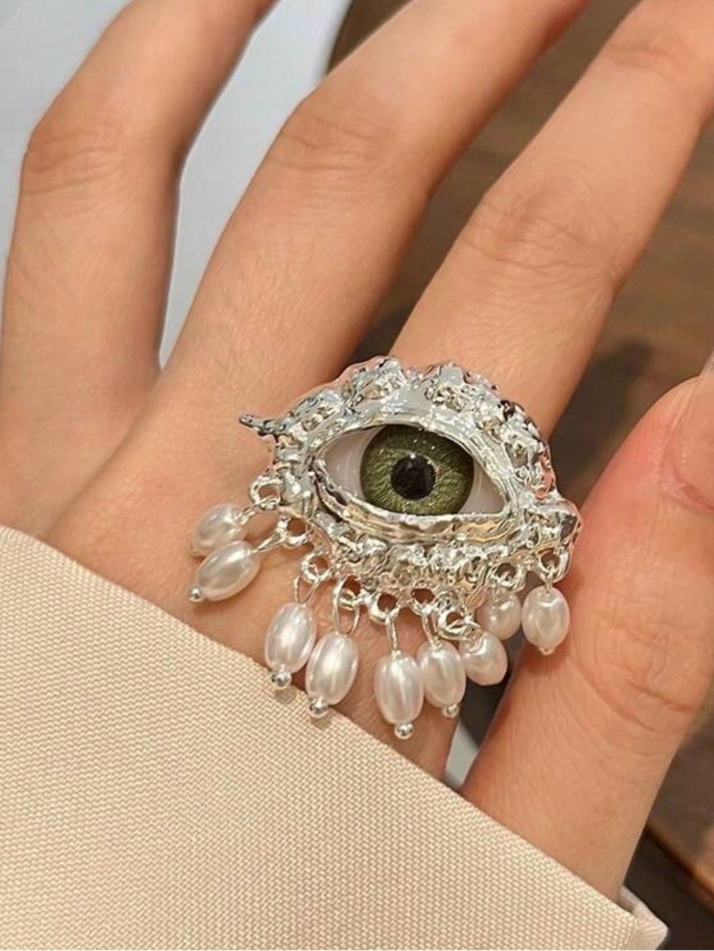 Silver Eye Ring with Green Center and Pearl Drops